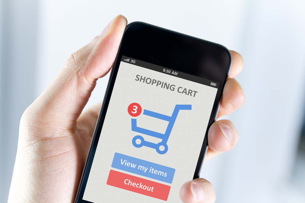 Mobile screen showing shopping cart icon with three items added